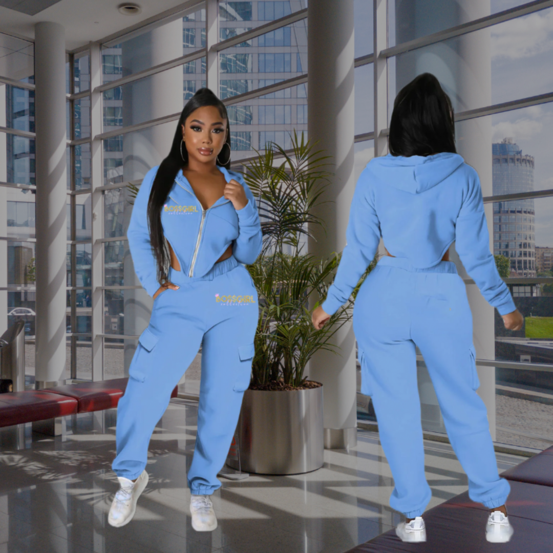Woman in 2 piece jogger set. Pointed cut cropped hoodie.