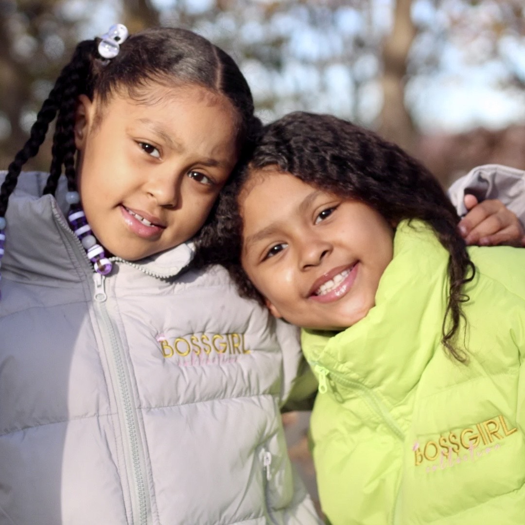 Two young girls wearing Boss Girl Puffer